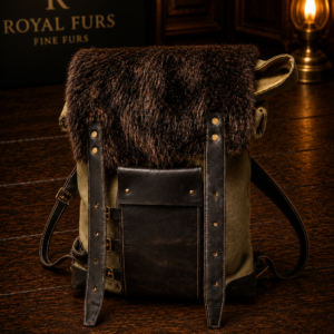 Handcrafted beaver fur backpack with waxed canvas body and full-grain leather details.