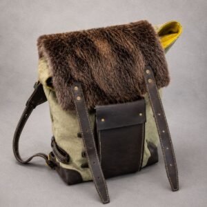 Handcrafted beaver fur backpack with waxed canvas body and full-grain leather details.